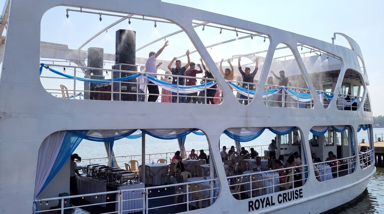 Upper deck rain dance crowd, hands up